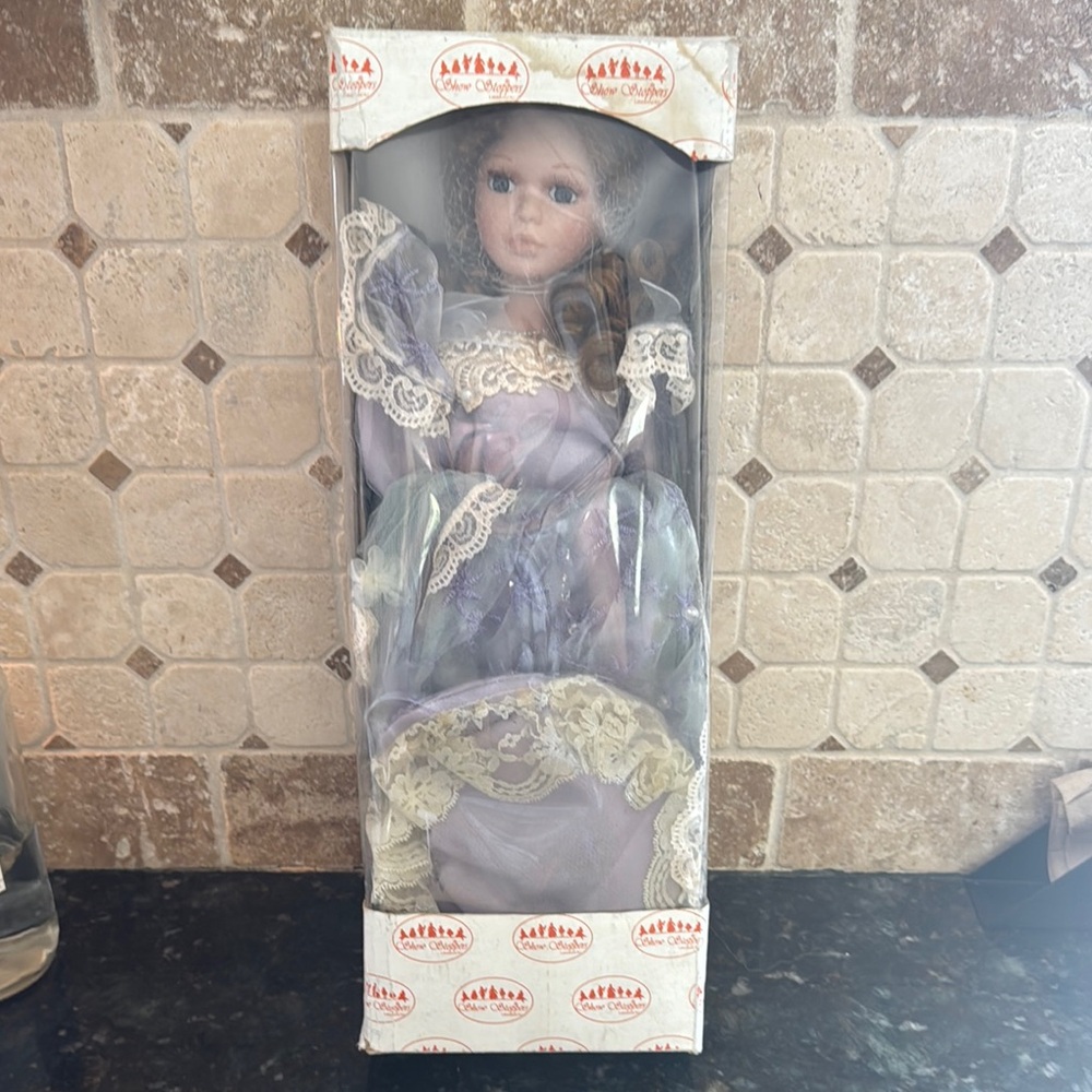Elegant Porcelain Doll in Lavender Dress